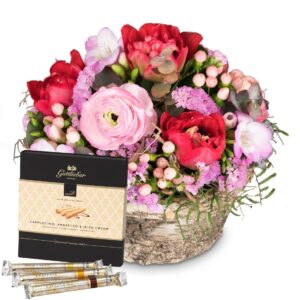 Zarter Frühlingskorb mit Gottlieber Hüppen "Special Edition for Fleurop"